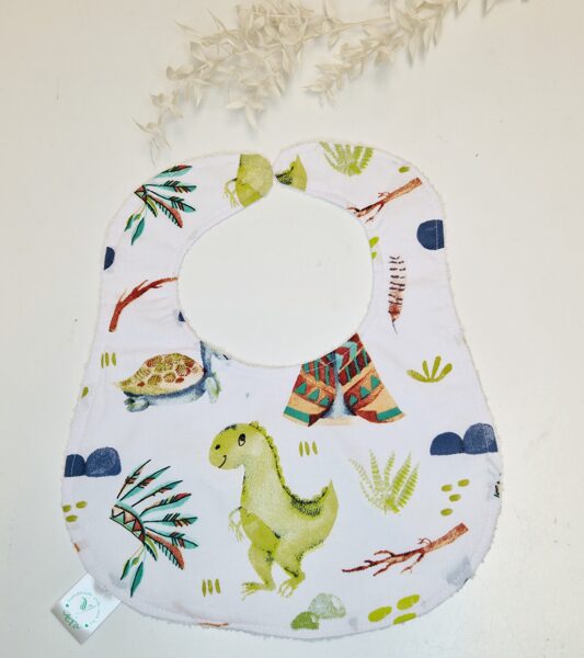 Lacīte-siekalu ķērājs ar dino un bruņurupuci